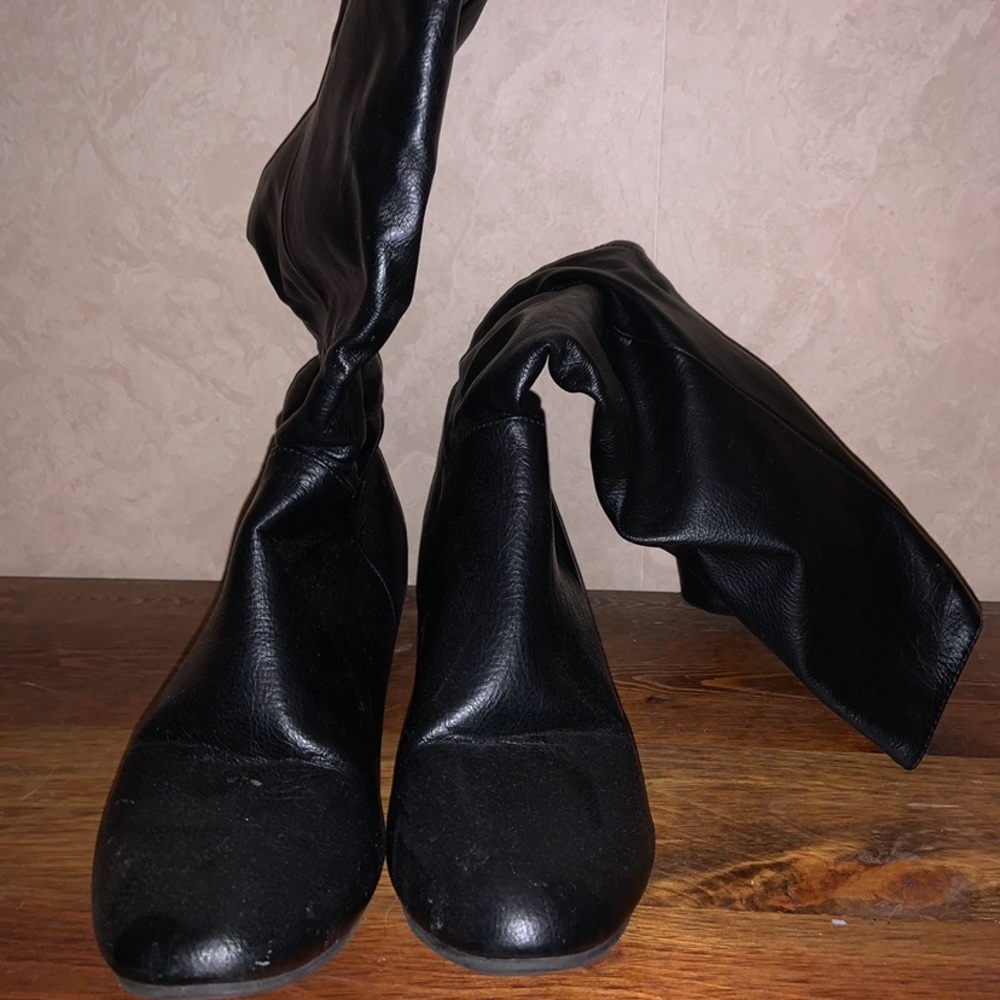 Black slouch boot.